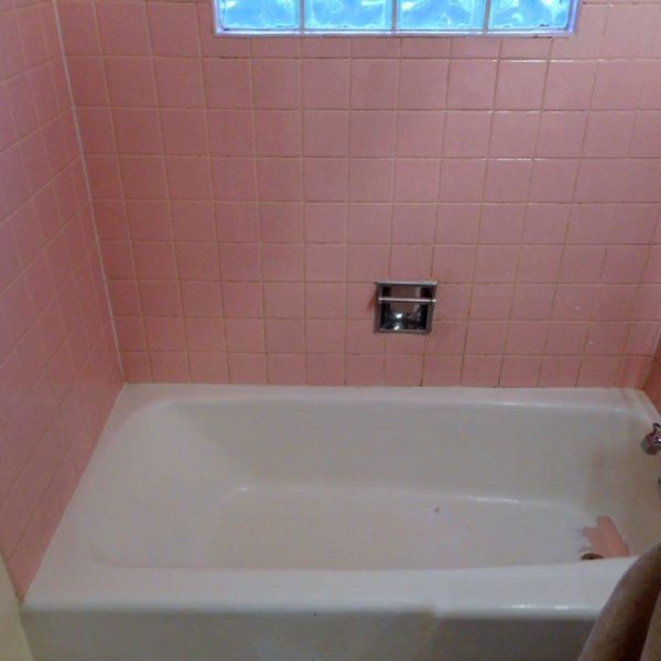 Dated pink ceramic tile before refinishing in Naperville, IL.