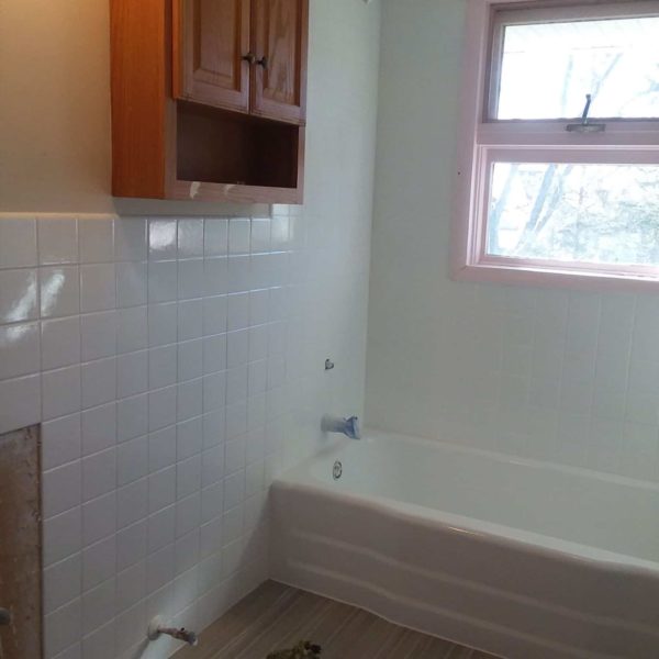 Ceramic bathroom tile after being refinished in Lombard, IL.