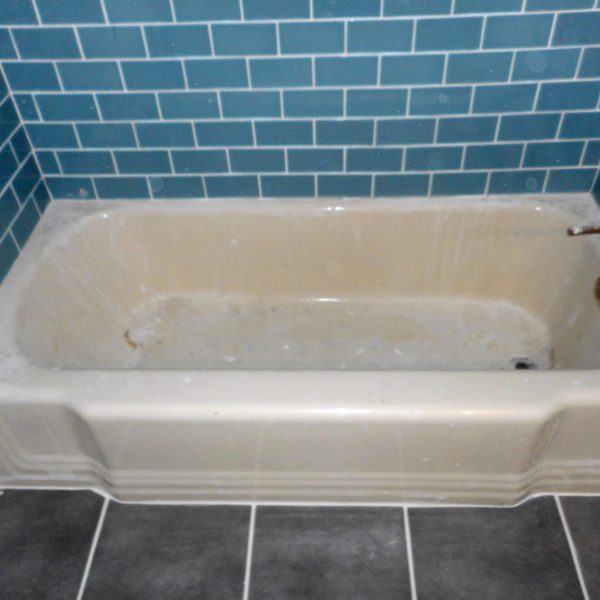 Solid but aged porcelain bathtub before refinishing in Geneva, IL.