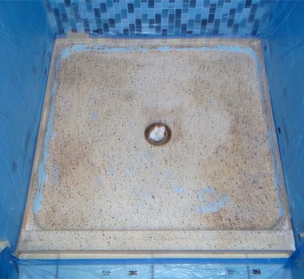 Worn and stained shower base before refinishing in Downers Grove, IL