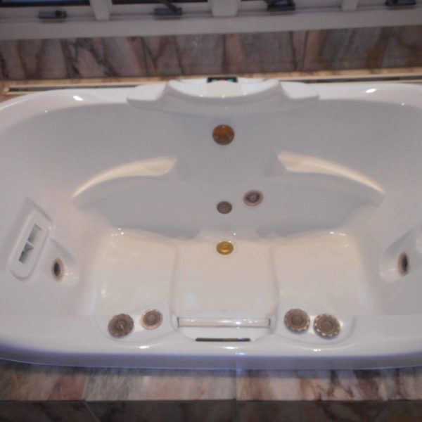 Jetted whirlpool bathtub refinished in marshmallow white in Burr Ridge, IL.