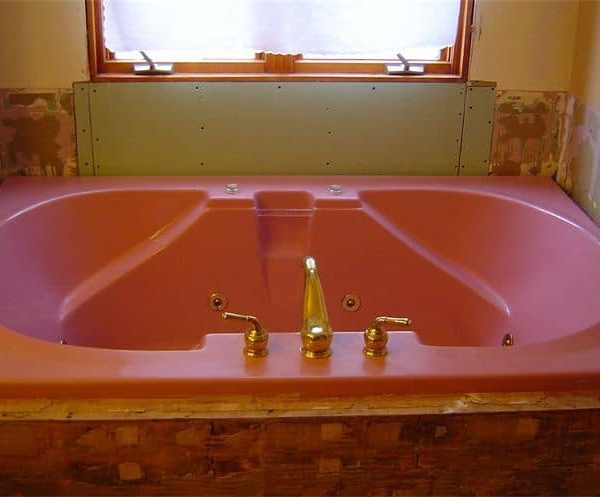 Large Whirlpool Tub in dated mauve color BEFORE in St. Charles, IL