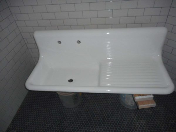 Antique-porcelain-sink-with-single-washboard-after-refinishing-in-Kohler-white-in-Morris-IL