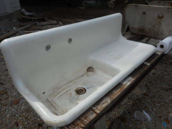 Old-antique-porcelain-sink-with-single-washboard-before-refinishing-in-Morris-IL