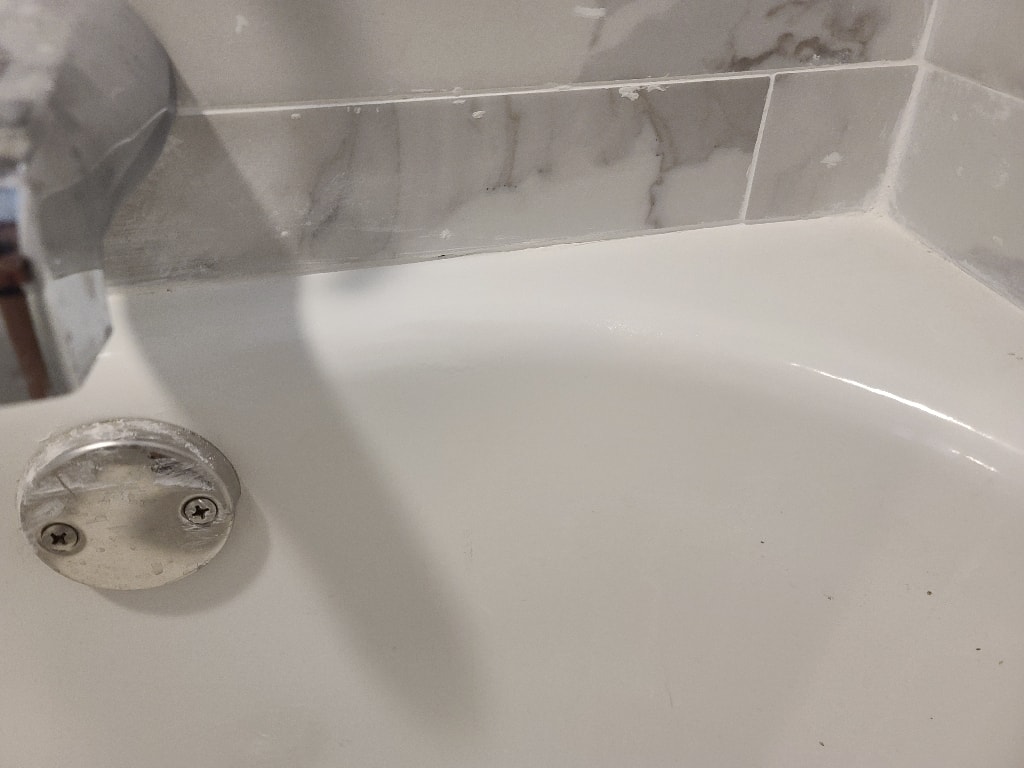 Porcelain bathtub after chip repair in Chicago, IL.